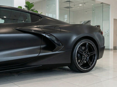 Chevrolet Corvette C8 wrapped in Satin HX20000 Deep Black Wet restyling film HX20890W