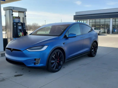 Tesla X wrapped in Matte HX20000 Metallic Night Blue vinyl wrap HX20905M