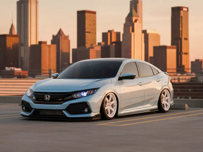 Honda Civic wrapped in Hexis Gloss HX20000 Jazz Blue automotive vinyl film HX20B32B