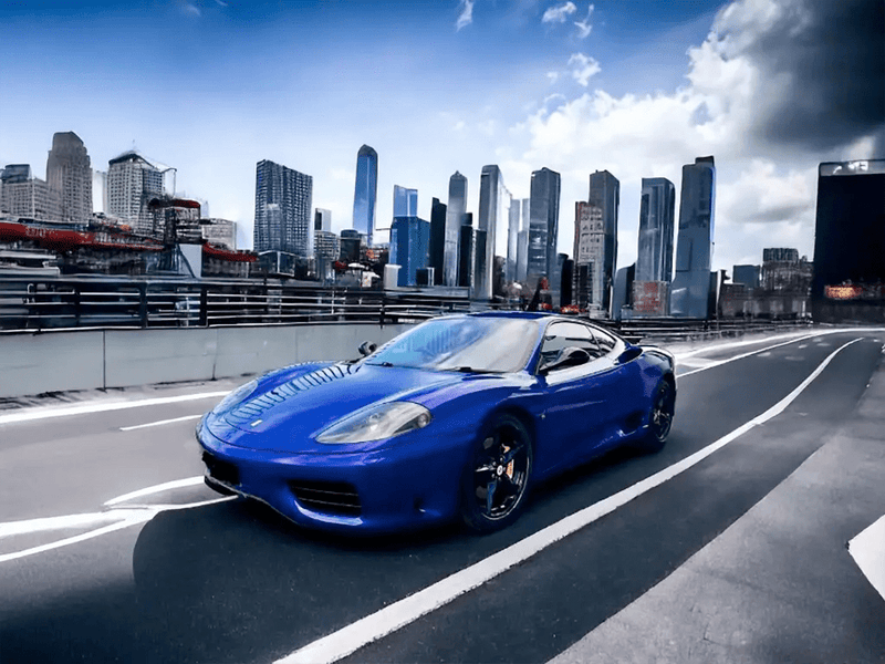 Ferrari 360 Modena wrapped in Gloss HX20000 Ephesus Blue automotive vinyl film HX20B36B