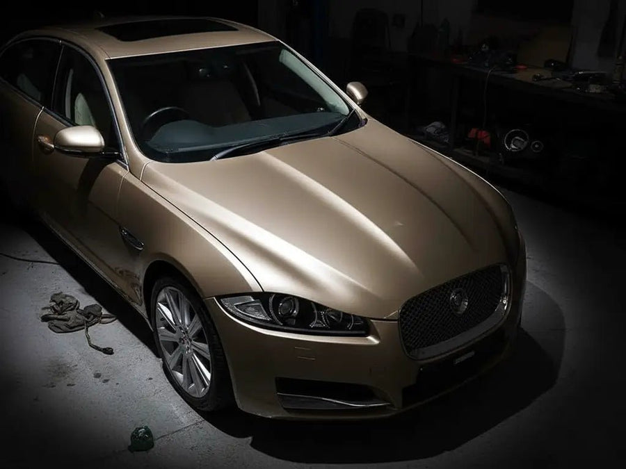 Jaguar XF wrapped in Gloss HX20000 Metallic Ashen Beige restyling film HX20BCMB