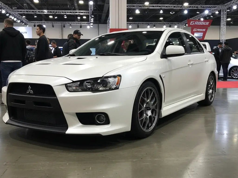 Mitsubishi Lancer Evolution wrapped in Satin HX20000 Nacre White automotive vinyl film HX20BNCS