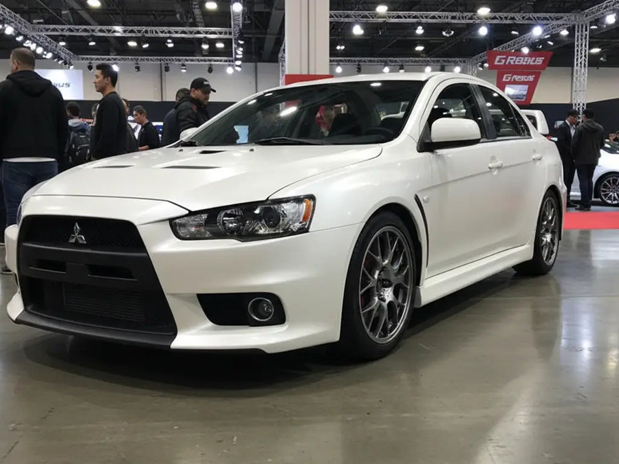 Mitsubishi Lancer Evolution wrapped in Satin HX20000 Nacre White automotive vinyl film HX20BNCS