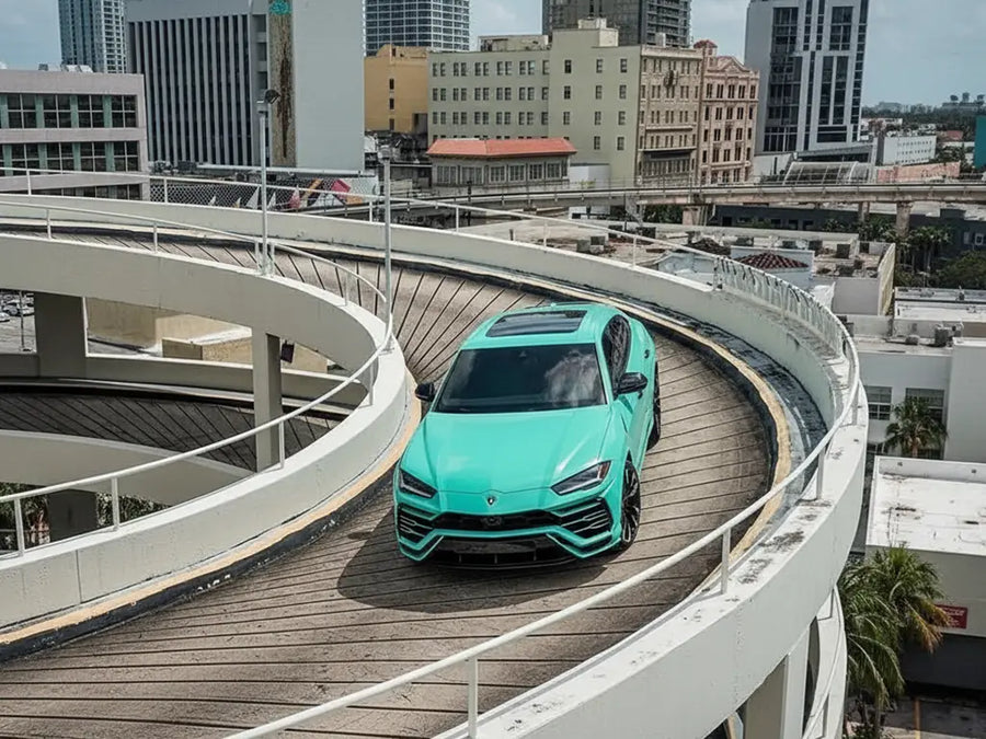 Lamborghini Urus wrapped in Gloss HX20000 Ti Blue wrap film HX20BTIB
