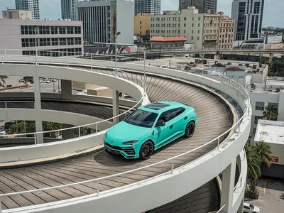 Lamborghini Urus wrapped in Hexis Gloss HX20000 Ti Blue wrap film HX20BTIB