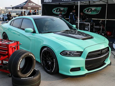 Dodge Charger wrapped in Hexis Gloss HX20000 Ti Blue vinyl wrap HX20BTIB