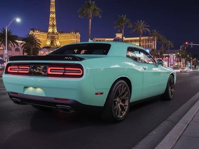 Dodge Challenger wrapped in Hexis Gloss HX20000 Ti Blue automotive vinyl film HX20BTIB