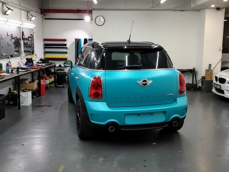 MINI Countryman wrapped in Matte HX20000 Turquoise Blue automotive vinyl film HX20BTUM