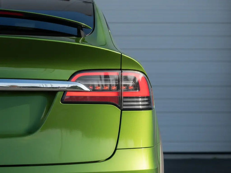 Tesla S wrapped in Gloss HX20000 Fairway Green automotive vinyl film HX20VFAB