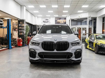 BMW X5 wrapped in Hexis Gloss HX20000 Dust Grey vinyl wrap HX20G06B