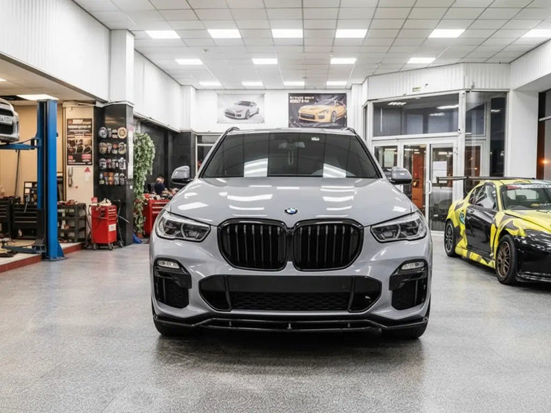 BMW X5 wrapped in Hexis Gloss HX20000 Dust Grey vinyl wrap HX20G06B