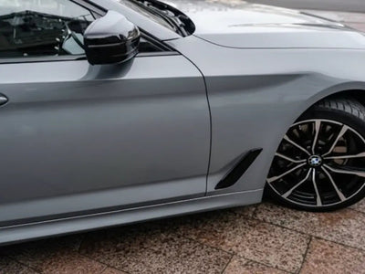 BMW 5 Series wrapped in Hexis Gloss HX20000 Dust Grey restyling film HX20G06B