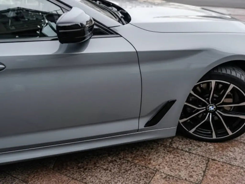 BMW 5 Series wrapped in Hexis Gloss HX20000 Dust Grey restyling film HX20G06B