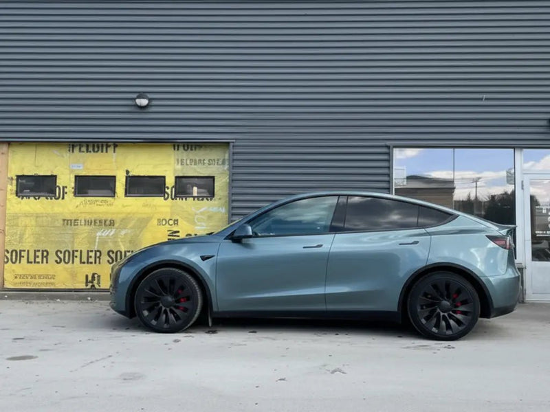 Tesla Y wrapped in Gloss HX20000 Aston Grey automotive vinyl film HX20G07B