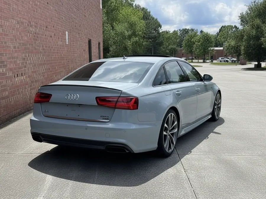 Audi S6 wrapped in Hexis Gloss HX20000 Pleaides Grey restyling film HX20G12B