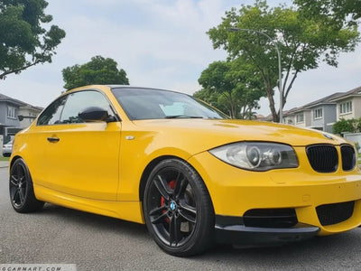 BMW 1 Series Coupe wrapped in Gloss HX20000 Honey Yellow automotive vinyl film HX20JMIB