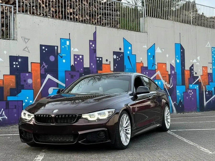 BMW 4 Series wrapped in Gloss HX20000 Vampire Black wrap film HX20N03B