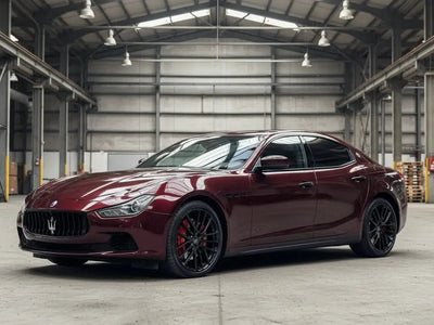 Maserati Ghibli wrapped in Gloss HX20000 Vampire Black wrap film HX20N03B