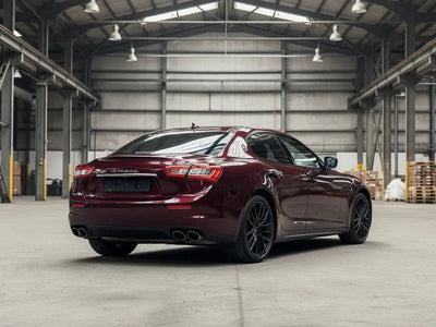 Maserati Quattroporte wrapped in Hexis Gloss HX20000 Vampire Black automotive vinyl film HX20N03B