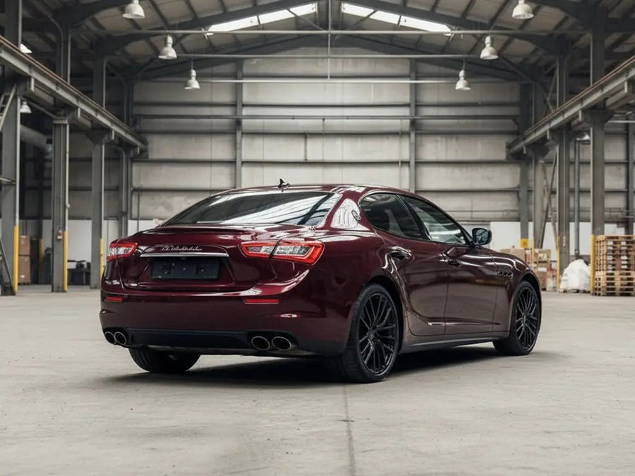 Maserati Quattroporte wrapped in Hexis Gloss HX20000 Vampire Black automotive vinyl film HX20N03B