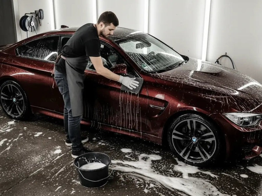 BMW M4 wrapped in Hexis Gloss HX20000 Vampire Black restyling film HX20N03B