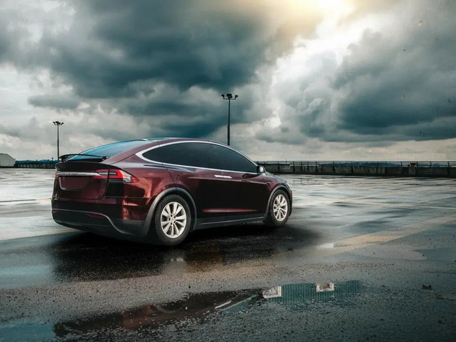 Tesla X wrapped in Gloss HX20000 Vampire Black wrap film HX20N03B