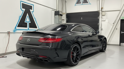 Mercedes-Benz S-Class Coupe wrapped in Hexis Gloss HX20000 Catechu Black restyling film HX20NCAB