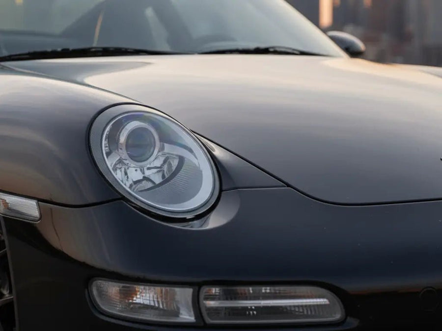 Porsche 911 wrapped in Gloss HX20000 Mystery Black car wrap film HX20NMYB