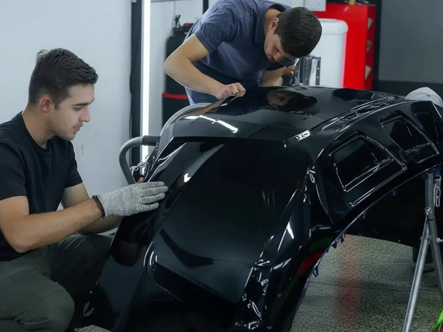 Car wrapped in Hexis Gloss HX20000 Mystery Black vinyl wrap HX20NMYB