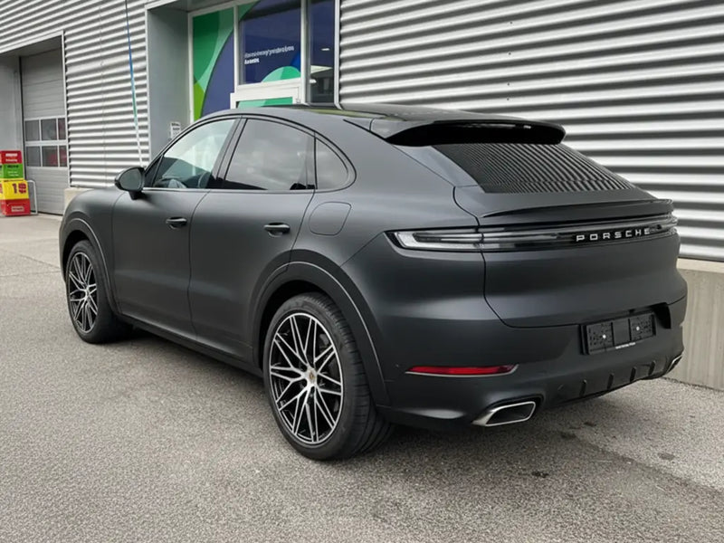 Porsche Cayenne wrapped in Hexis Satin HX20000 Deep Black automotive vinyl film HX20NPRS