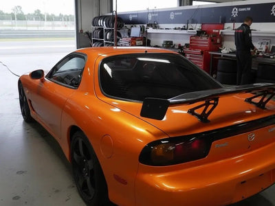 Mazda RX-7 wrapped in Gloss HX20000 Aurora Orange wrap film HX20OAUB