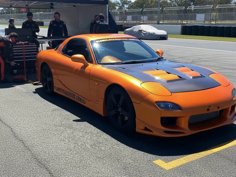 DIY Mazda RX-7 wrapped in Gloss HX20000 Aurora Orange restyling film HX20OAUB