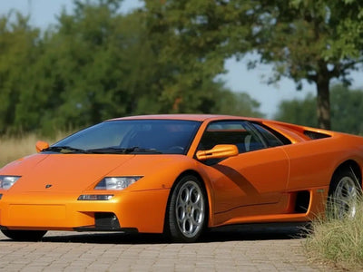Lamborghini Diablo wrapped in Hexis Gloss HX20000 Aurora Orange automotive vinyl film HX20OAUB