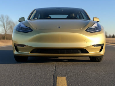 DIY Tesla 3 wrapped in Gloss HX20000 Zeus Gold car wrap film HX20P001