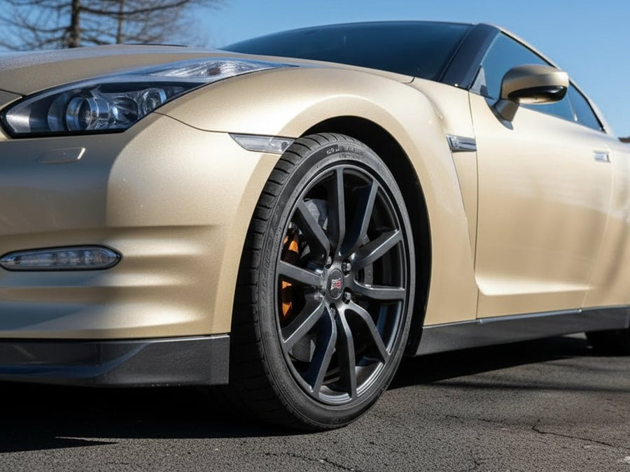DIY Nissan GT-R wrapped in Gloss HX20000 Zeus Gold restyling film