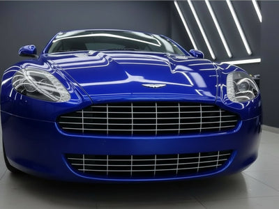 DIY Aston Martin DB9 wrapped in Gloss HX20000 Triton Blue restyling film HX20P005