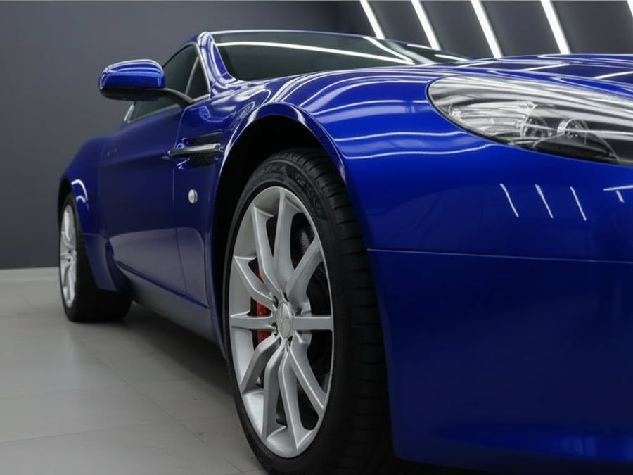 Aston Martin V8 Vantage wrapped in Hexis Gloss HX20000 Triton Blue vinyl wrap HX20P005 detail