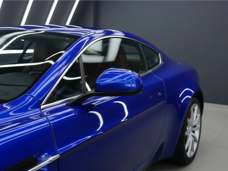 Aston Martin Vamtage wrapped in Gloss HX20000 Triton Blue car wrap film HX20P005