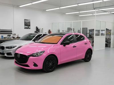 Mazda 2 wrapped in Hexis Gloss HX20000 Lady Pink wrap film HX20R11B