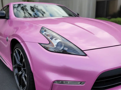 Nissan 370Z wrapped in Hexis Gloss HX20000 Jellybean Pink automotive vinyl film HX20RDRB