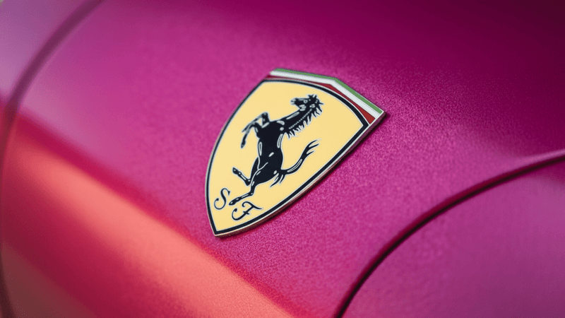 DIY Ferrari wrapped in Gloss HX20000 Indian Pink vinyl wrap HX20RINB