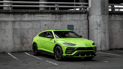 Lamborghini Urus wrapped in Gloss HX20000 Toxic Green car wrap film HX20V24B