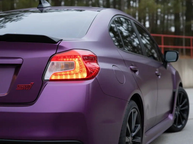 Subaru WRX STI wrapped in Hexis Satin HX20000 Deep Purple Wet restyling film HX20V43W