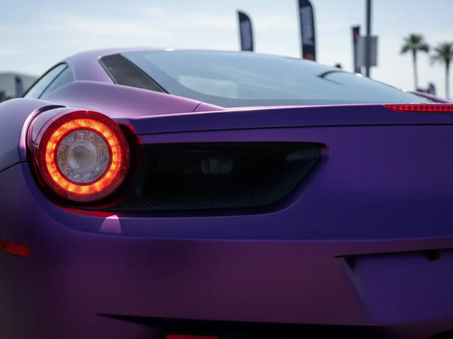 Ferrari 458 wrapped in Hexis Satin HX20000 Deep Purple Wet vinyl wrap HX20V43W