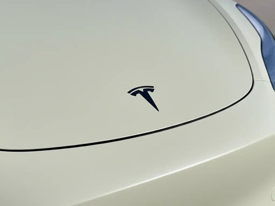 Tesla 3 wrapped in Matte HX20000 Adventure Green vinyl wrap HX20VAVM