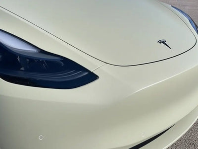 Tesla 3 wrapped in Matte HX20000 Adventure Green automotive vinyl film HX20VAVM