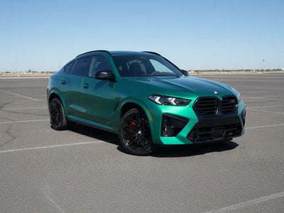 BMW X6 M wrapped in Gloss HX20000 Scottish Green restyling film HX20VECB
