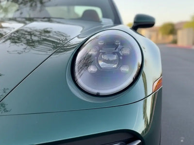Porsche 911 wrapped in Gloss HX20000 Scottish Green wrap film HX20VECB