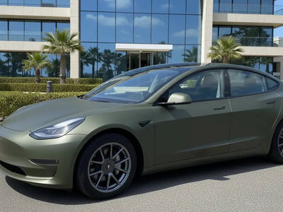 Tesla 3 wrapped in Hexis Matte HX20000 Military Green car wrap film HX20VMIM
