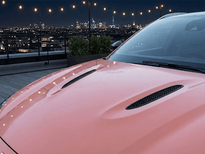 DIY Aston Martin Vantage wrapped in Super Gloss HXONE™ Phoenix Ocher vinyl wrap HXONE301
